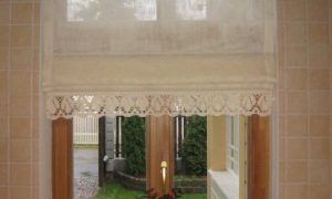 roman curtains with flower on the windowsill