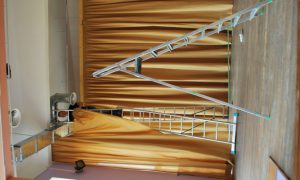Hanging of curtains installation